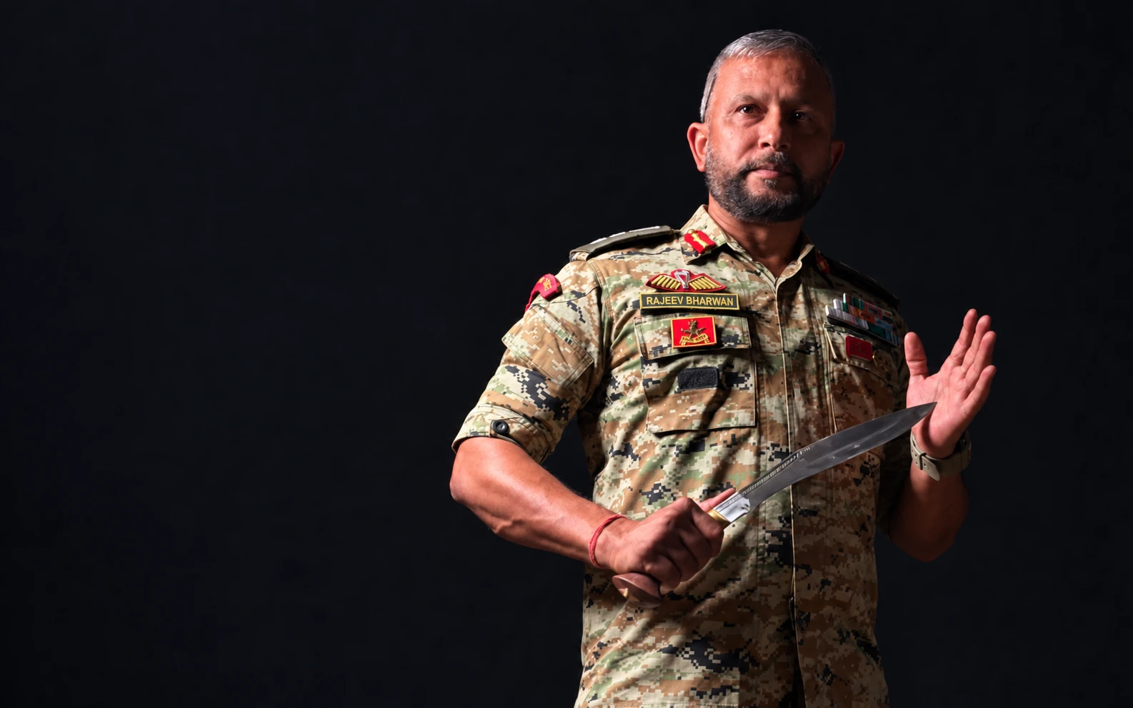 Colonel Rajeev Bharwan in military uniform during a training demonstration